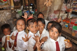 School kids in the only shop buying candy